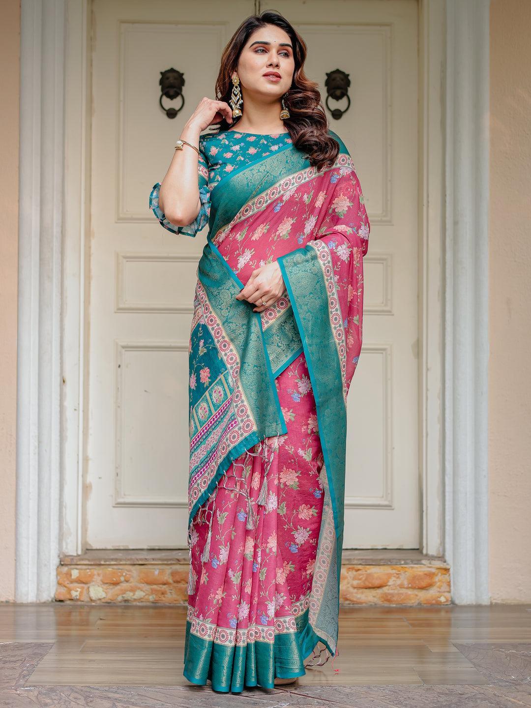Rani Pink & Teal Green Floral Printed Saree with Rich Zari Border & Tassels – Festive Traditional Wear