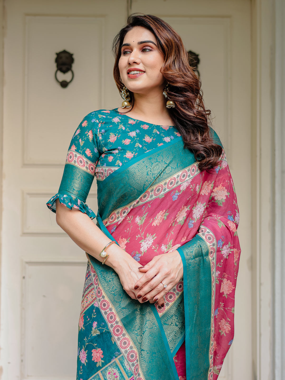 Rani Pink & Teal Green Floral Printed Saree with Rich Zari Border & Tassels – Festive Traditional Wear