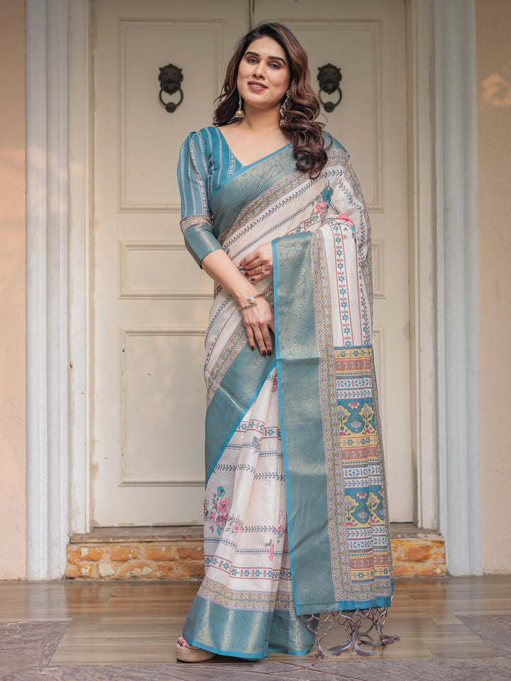 Off-White & Aqua Teal Traditional Printed Saree with Rich Zari Border & Tassels – Elegant Ethnic Festive Wear