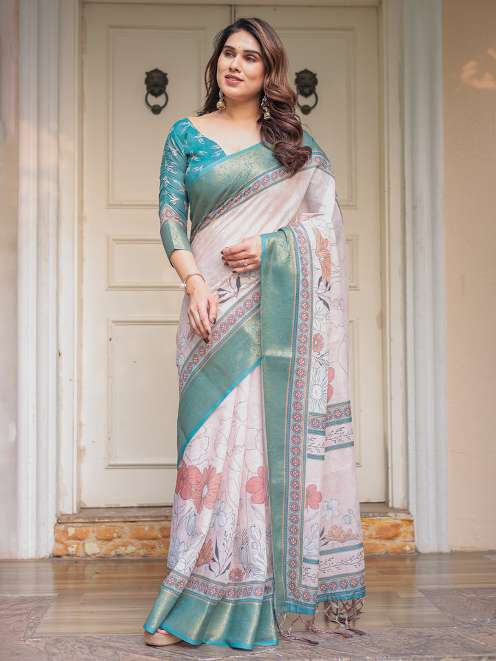 Pastel Lavender Floral Printed Saree with Teal Green Zari Border & Tassels – Elegant Festive Ethnic Wear