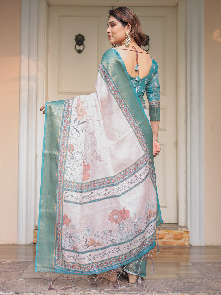 Pastel Lavender Floral Printed Saree with Teal Green Zari Border & Tassels – Elegant Festive Ethnic Wear