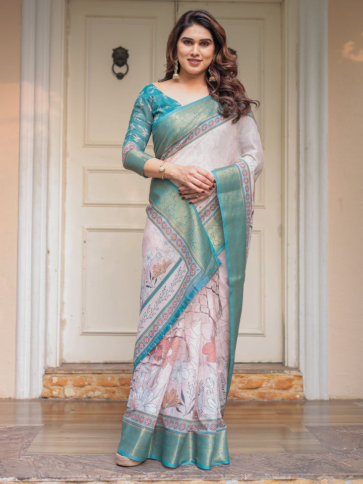 Pastel Lavender Floral Printed Saree with Teal Green Zari Border & Tassels – Elegant Festive Ethnic Wear