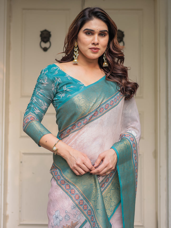 Pastel Lavender Floral Printed Saree with Teal Green Zari Border & Tassels – Elegant Festive Ethnic Wear