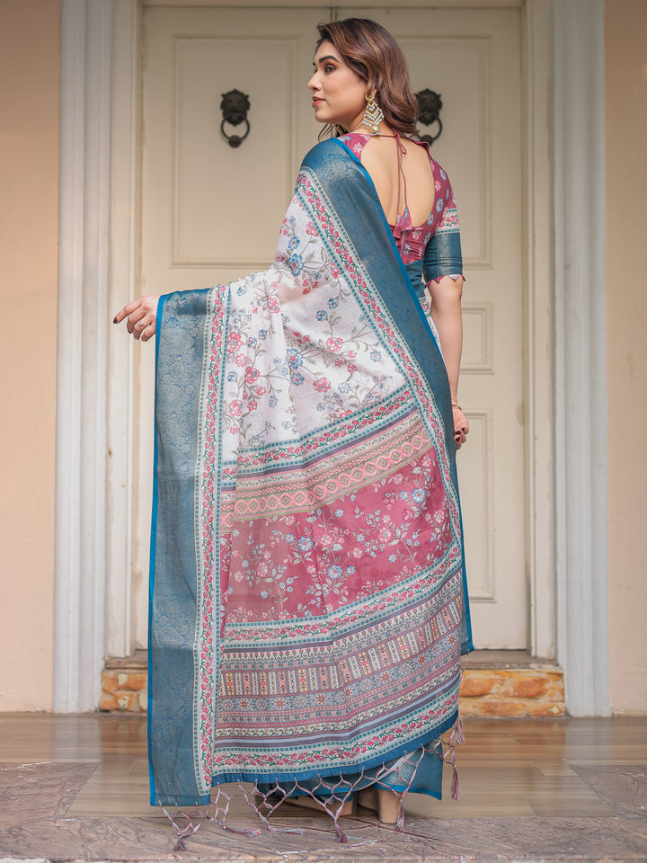 Ivory Floral Printed Saree with Rose Pink & Teal Blue Zari Border & Tassels – Elegant Festive Ethnic Wear