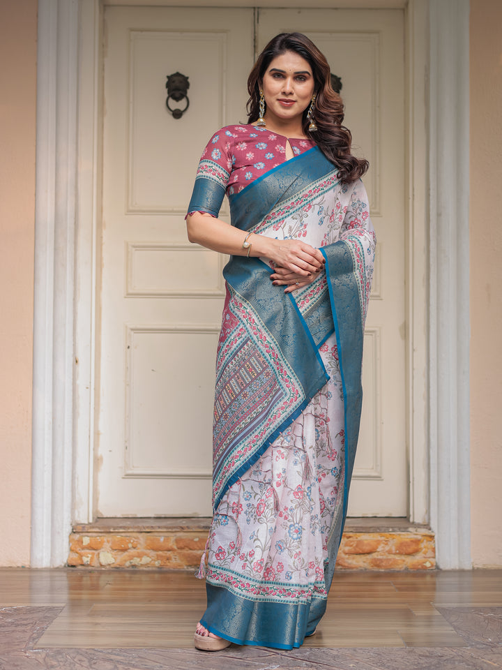Ivory Floral Printed Saree with Rose Pink & Teal Blue Zari Border & Tassels – Elegant Festive Ethnic Wear