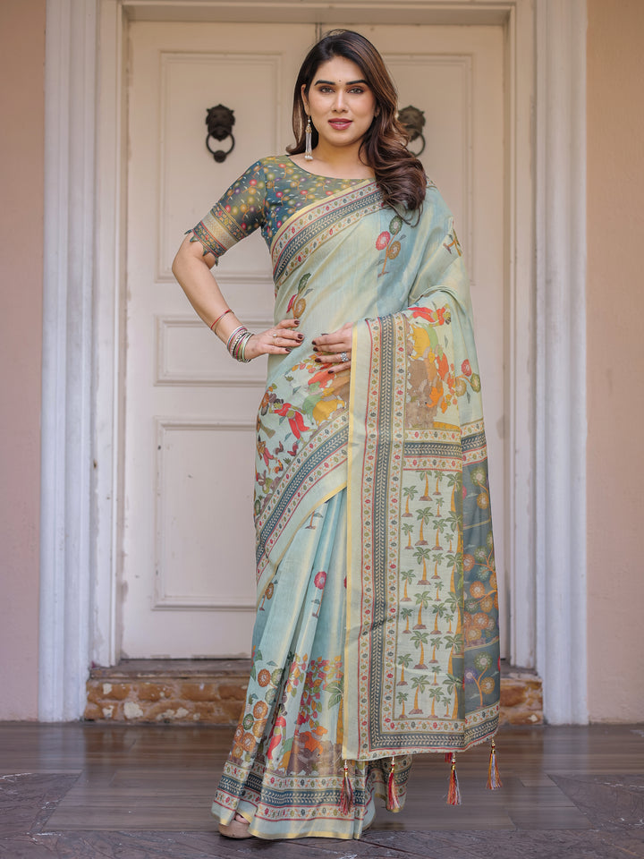 Mint Green Folk Printed Handloom Cotton Saree with Village Scene Panel Pallu, Ornamental Border & Tassels – Traditional Ethnic Wear