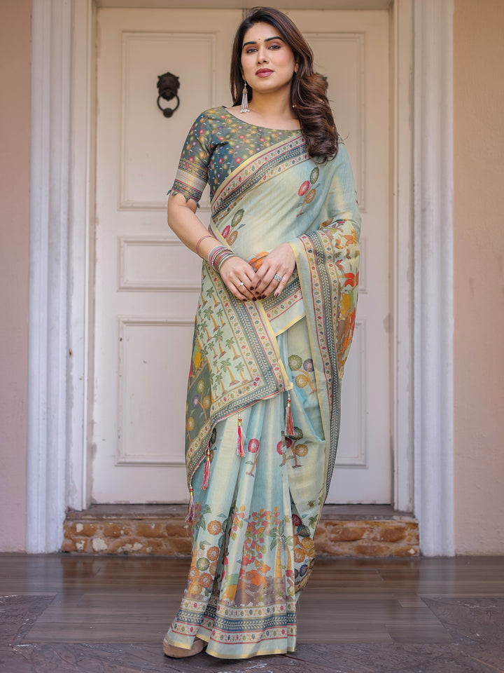Mint Green Folk Printed Handloom Cotton Saree with Village Scene Panel Pallu, Ornamental Border & Tassels – Traditional Ethnic Wear