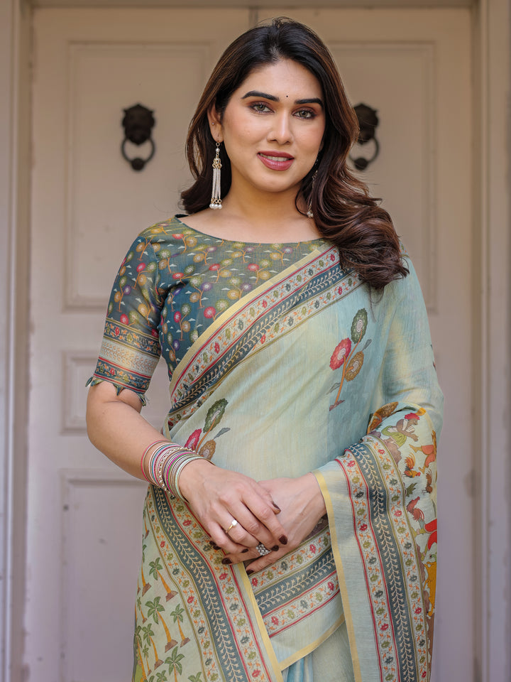 Mint Green Folk Printed Handloom Cotton Saree with Village Scene Panel Pallu, Ornamental Border & Tassels – Traditional Ethnic Wear