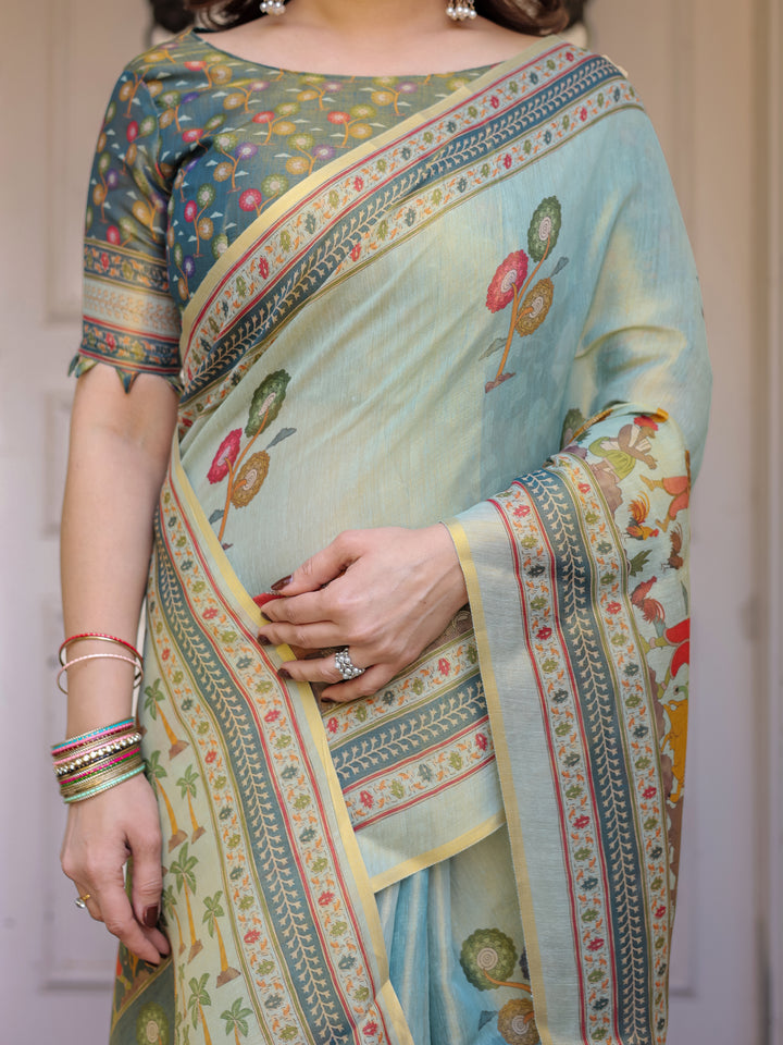 Mint Green Folk Printed Handloom Cotton Saree with Village Scene Panel Pallu, Ornamental Border & Tassels – Traditional Ethnic Wear