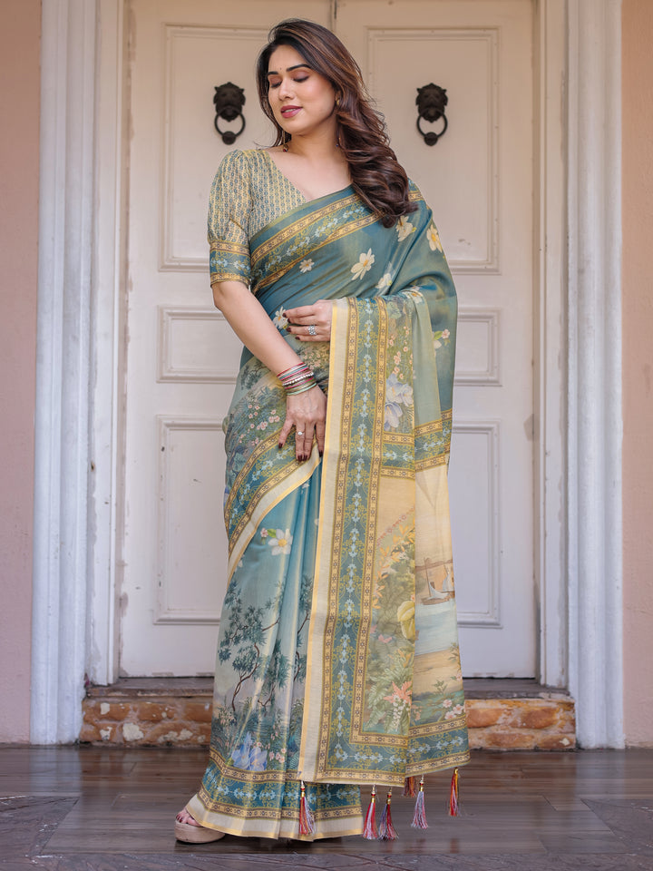 Pastel Sea-Green Scenic Landscape Printed Handloom Cotton Saree with Artistic Pallu & Tassels – Elegant Day Wear