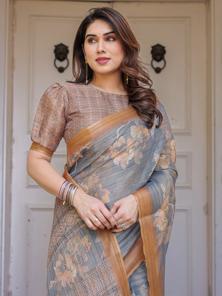 Steel Grey & Rust Gold Floral Handloom Cotton-Linen Saree with Zari Border & Tassels – Elegant Traditional Wear