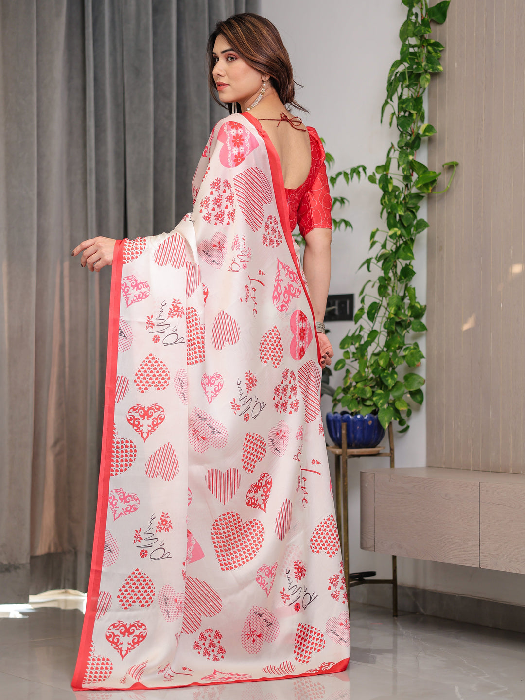 Ivory Pink & Red Love-Themed Satin Georgette Saree with Heart Prints and Romantic Pallu | Attached Blouse
