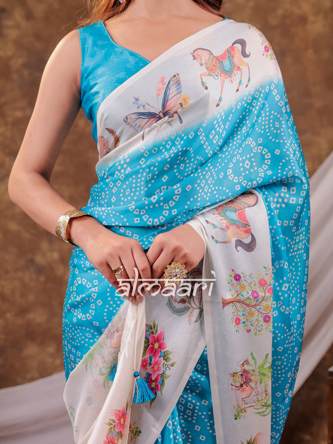 Vantara Aqua Blue Satin Chiffon Printed Saree with Heritage Floral Print, Designer Tassel Pallu & Matching Blouse Piece