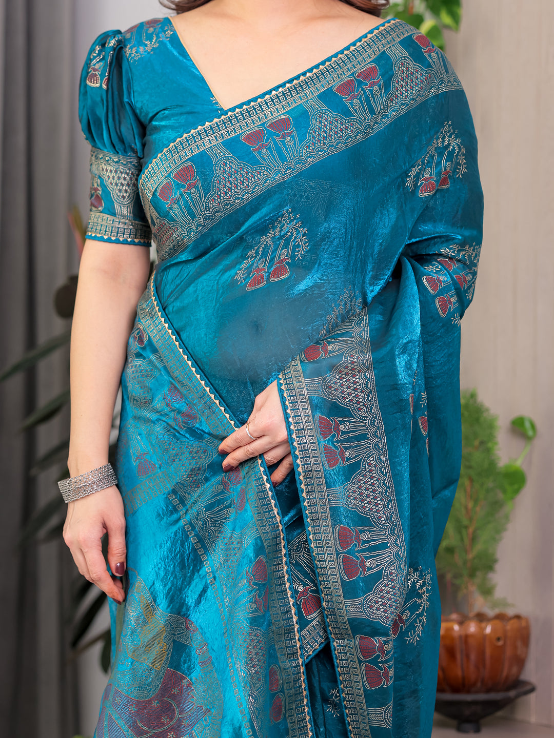 Teal Peacock Blue Fendi Satin Block & Foil Print Saree with Traditional Motif Border & Tassel Detail Blouse