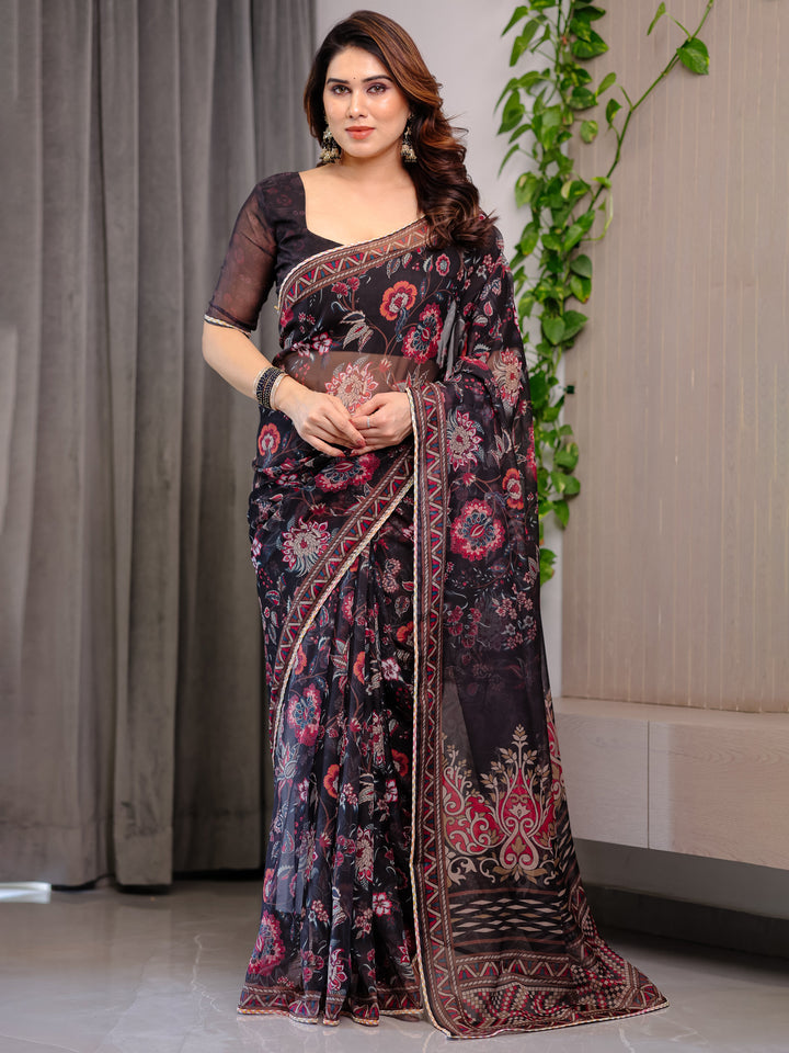 Black Floral Printed Organza Saree with Ethnic Border & Ornamental Pallu | Designer Sheer Organza Saree with Traditional Motifs & Blouse Piece | Elegant Festive & Party Wear Saree
