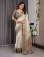 Elegant Cream & Gold Woven Ikat Silk Saree with Designer Border With Tassles