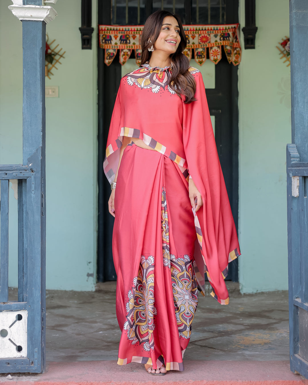 Coral Red Designer Freehand Saree with Mandala Pallu & Multicolor Border | Satin Georgette | Hole-in-the-Pallu Feature