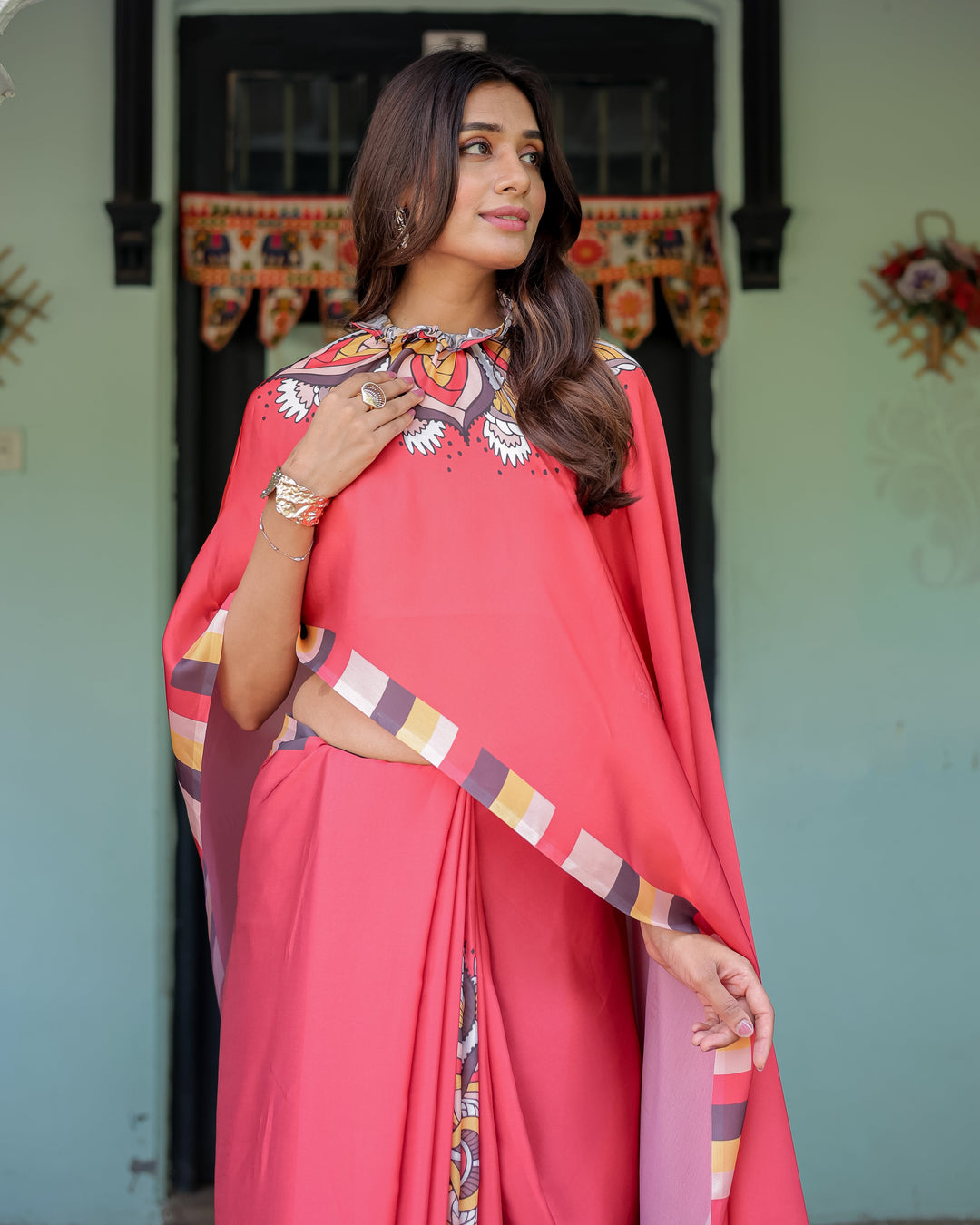 Coral Red Designer Freehand Saree with Mandala Pallu & Multicolor Border | Satin Georgette | Hole-in-the-Pallu Feature