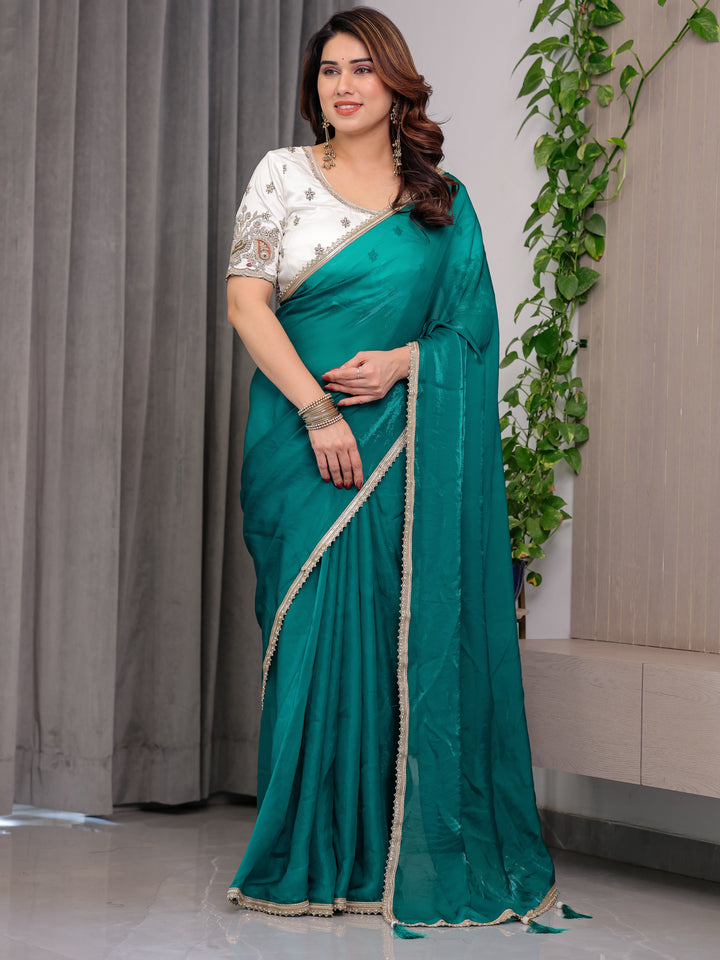 Emerald Green Fendy Satin Saree with Pearl Lace Border & Tassel Pallu | Premium Shimmer Satin Saree with Heavy Embroidered Designer Blouse | Zari Floral & Peacock Embroidery Blouse Festive Saree