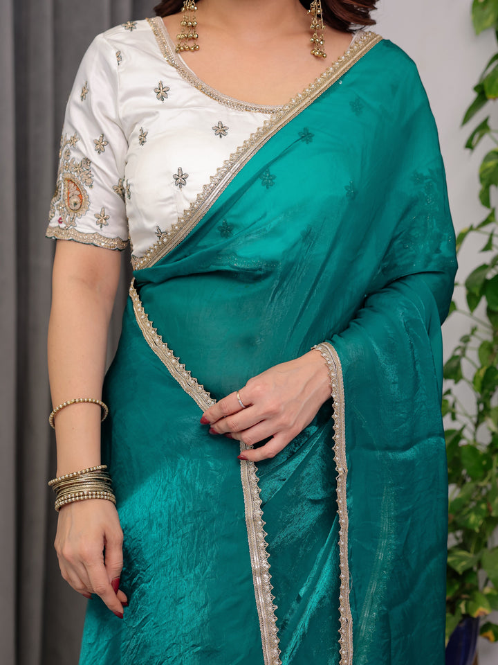 Emerald Green Fendy Satin Saree with Pearl Lace Border & Tassel Pallu | Premium Shimmer Satin Saree with Heavy Embroidered Designer Blouse | Zari Floral & Peacock Embroidery Blouse Festive Saree
