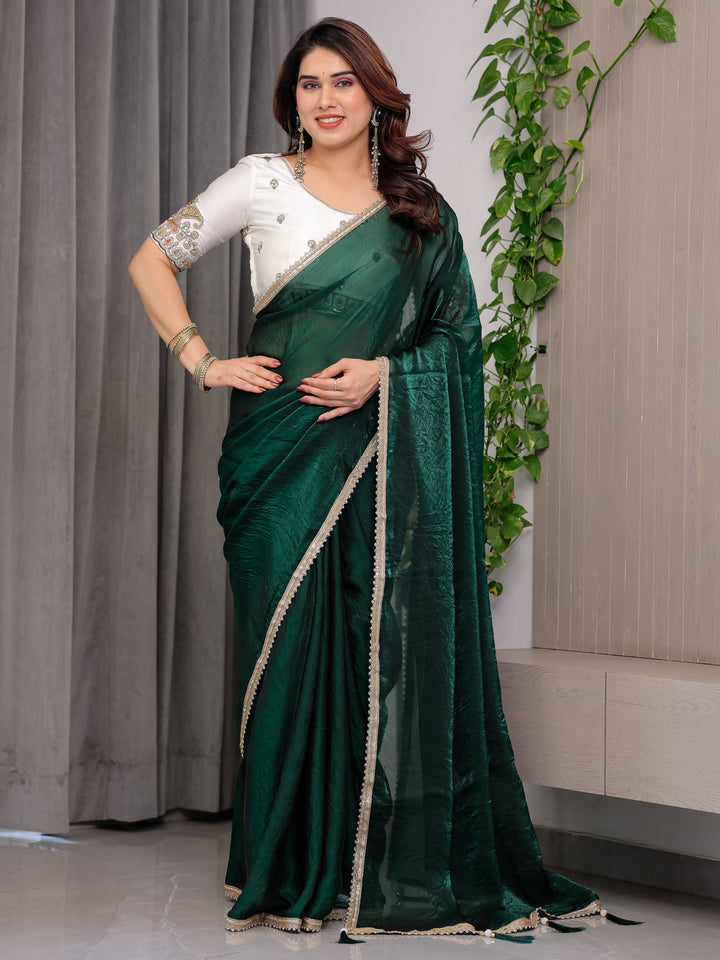 Emerald Bottle Green Fendy Satin Saree with Pearl Lace Border & Tassel Pallu | Premium Shimmer Satin Saree with Heavy Embroidered Designer Blouse | Zari Floral Paisley Embroidery Blouse Festive Saree