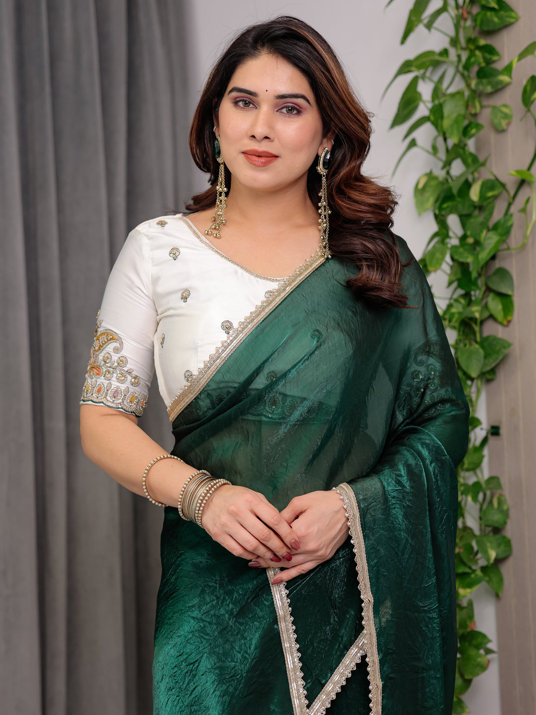 Emerald Bottle Green Fendy Satin Saree with Pearl Lace Border & Tassel Pallu | Premium Shimmer Satin Saree with Heavy Embroidered Designer Blouse | Zari Floral Paisley Embroidery Blouse Festive Saree