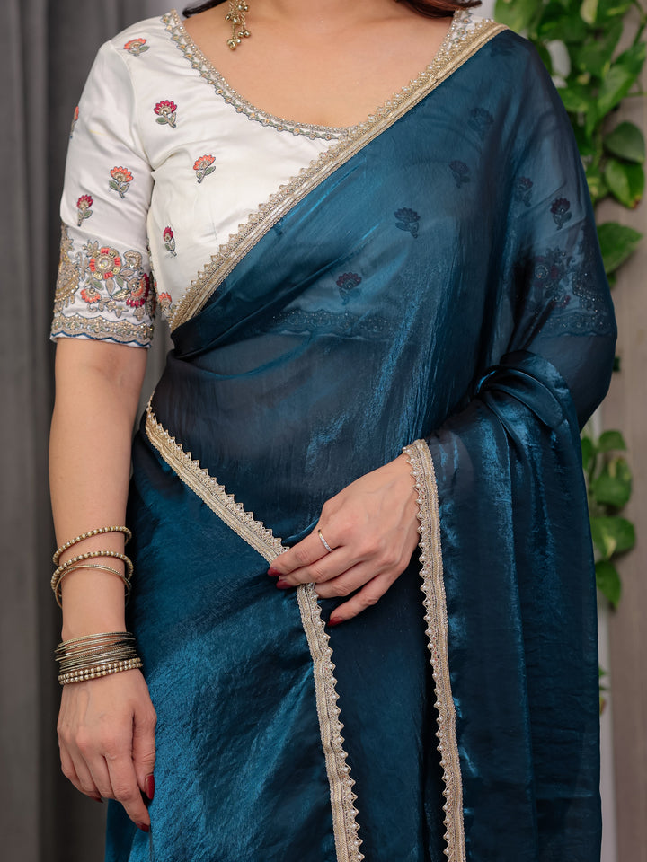 Deep Teal Fendy Satin Designer Saree with Pearl Lace Border & Tassel Pallu | Premium Shimmer Satin Saree with Heavy Floral Embroidered Ivory Blouse | Wedding & Festive Wear Saree