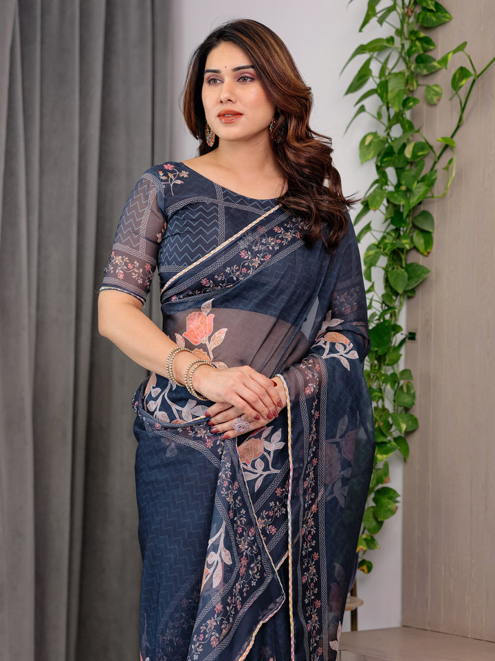 Midnight Blue Floral Printed Organza Saree with Elegant Floral Border & Multicolour Lace Edges | Designer Lightweight Organza Saree with Attached Blouse Piece | Festive & Party Wear Saree