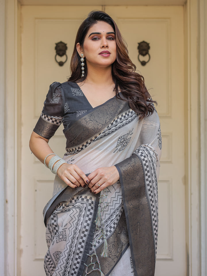 Charcoal Grey Handloom Cotton Printed Saree with Ethnic Geometric Pallu, Woven Border & Tassels – Classic Traditional Wear