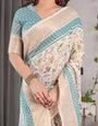 Ivory White Handloom Linen Saree with Aqua Floral Print & Gold Zari Border | Printed Pallu with Tassels | 5.5m Saree + 0.8m Blouse