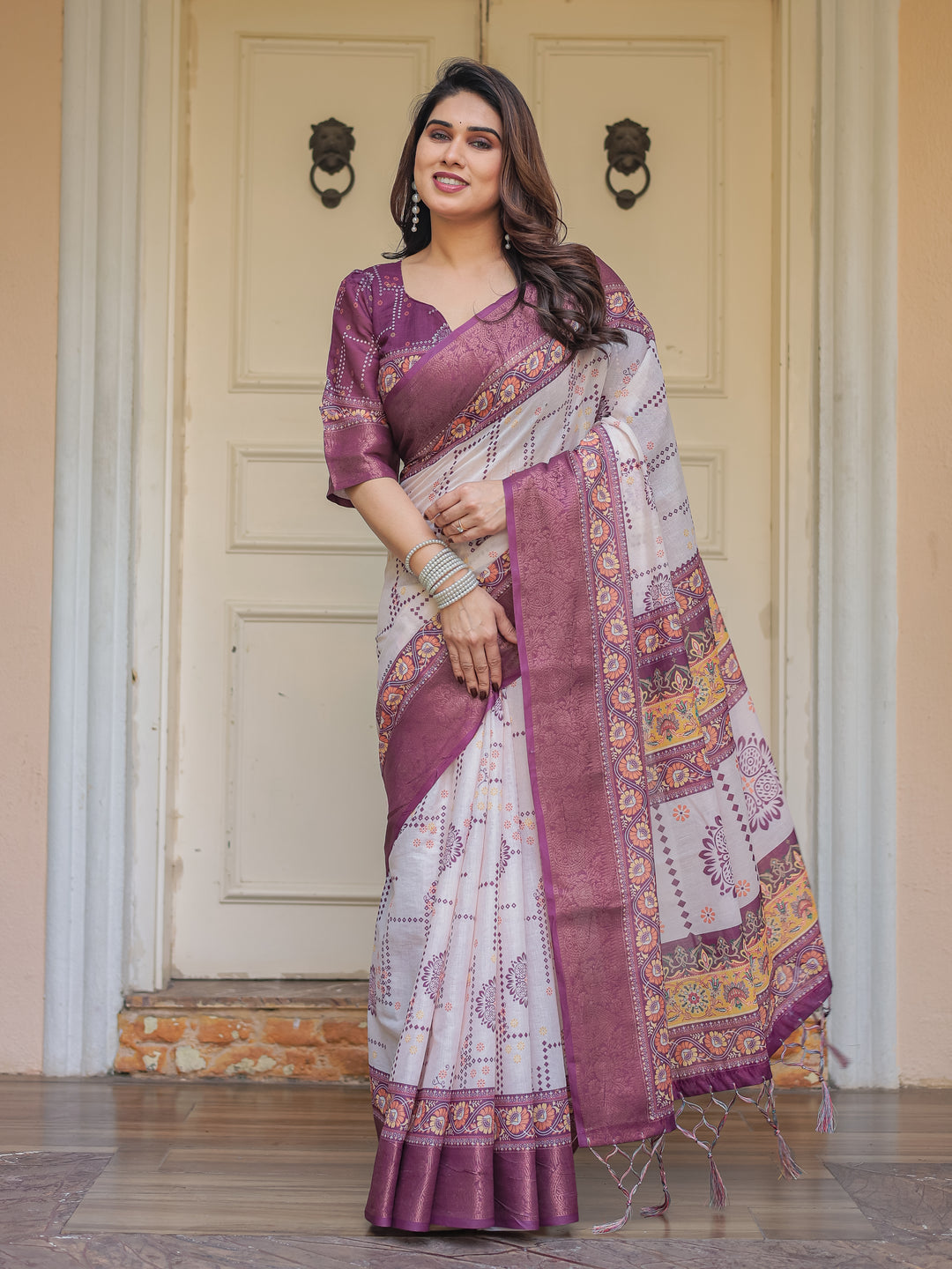 Wine Purple Handloom Cotton Printed Saree with Floral Panel Pallu, Ornamental Border & Tassels – Festive Ethnic Wear