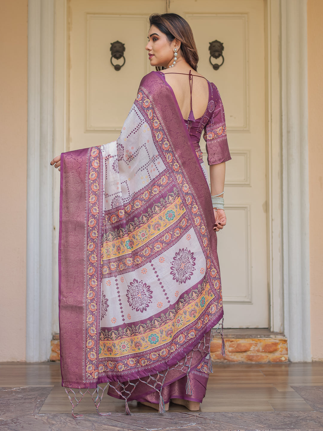 Wine Purple Handloom Cotton Printed Saree with Floral Panel Pallu, Ornamental Border & Tassels – Festive Ethnic Wear