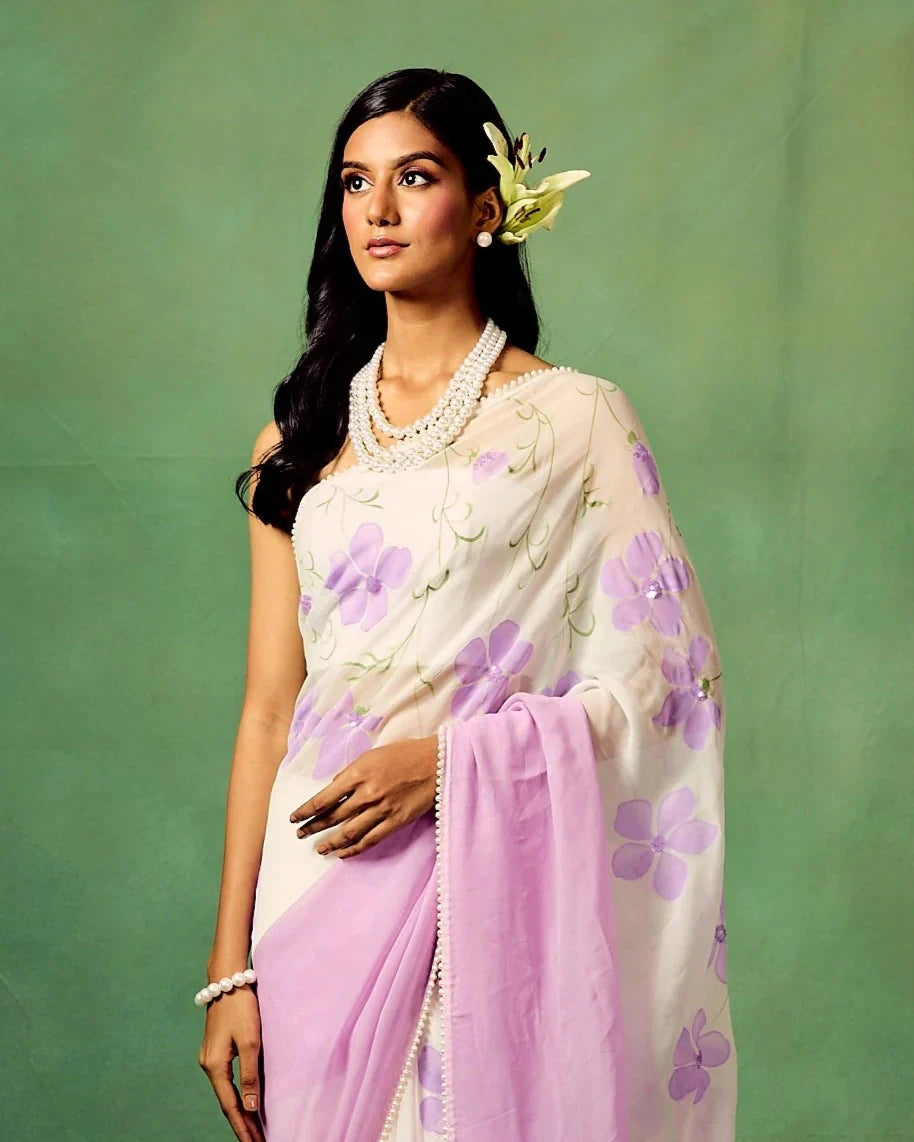 Lavender Bloom Pure Georgette Saree – Hand-Painted Floral Motifs with Sequins & Modal Satin Blouse