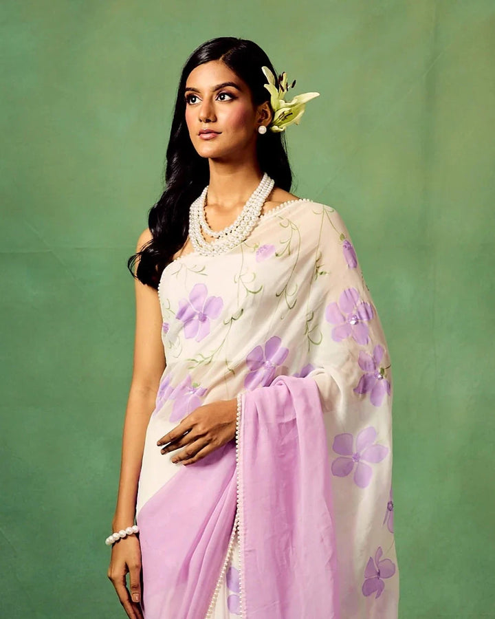 Lavender Bloom Pure Georgette Saree – Hand-Painted Floral Motifs with Sequins & Modal Satin Blouse