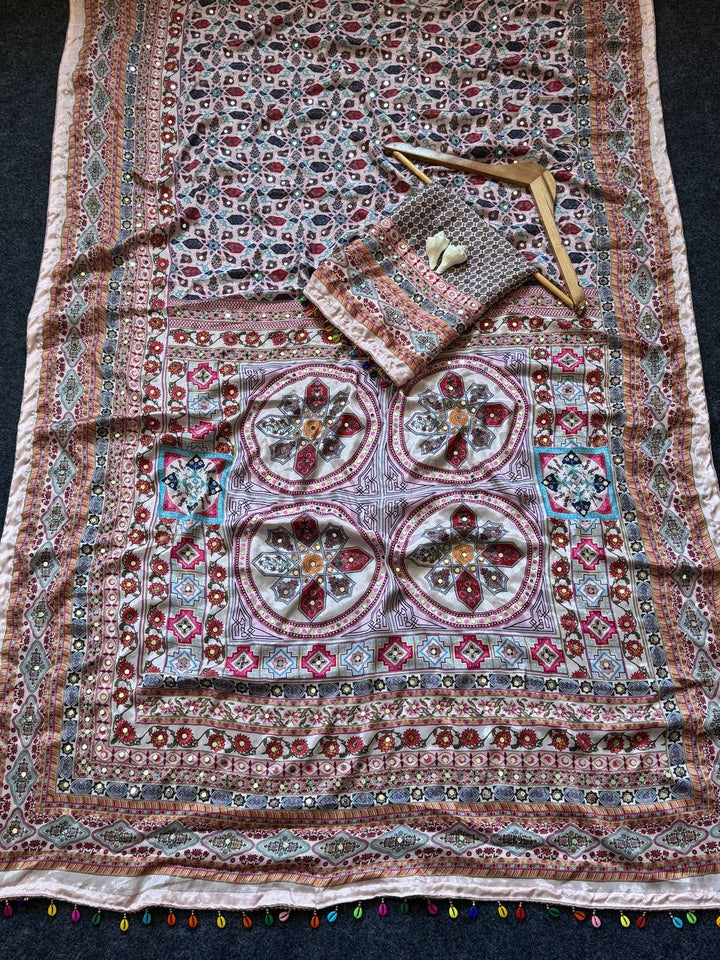Dusty Rose Heritage Print Modal Silk Saree with Intricate Floral Motifs, Ornamental Pallu & Multicolor Tassel Detailing